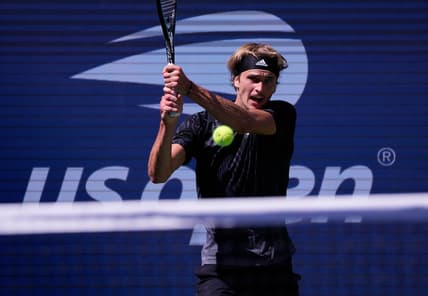 Sep 6, 2021; Flushing, NY, USA;  Alexander Zverev of Germany hits to Jannik Sinner of Italy on day eight of the 2021 U.S. Open tennis tournament at USTA Billie Jean King National Tennis Center. Mandatory Credit: Robert Deutsch-USA TODAY Sports