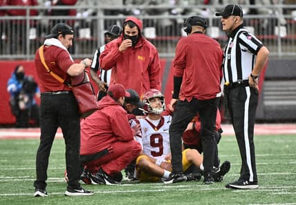 Sep 18, 2021; Pullman, Washington, USA; USC Trojans quarterback Kedon Slovis (9) is checked out by medical staff during a game against the Washington State Cougars in the first half at Gesa Field at Martin Stadium. Mandatory Credit: James Snook-USA TODAY Sports