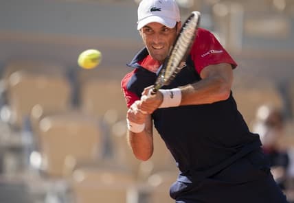 May 30, 2021; Paris, France; Pablo Andujar (ESP) in action during his match against Dominic Thiem (AUT) at Roland Garros Stadium. Mandatory Credit: Susan Mullane-USA TODAY Sports