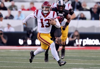 Oct 15, 2022; Salt Lake City, Utah, USA; USC Trojans quarterback Caleb Williams (13) runs against the Utah Utes in the first quarter at Rice-Eccles Stadium. Mandatory Credit: Rob Gray-USA TODAY Sports