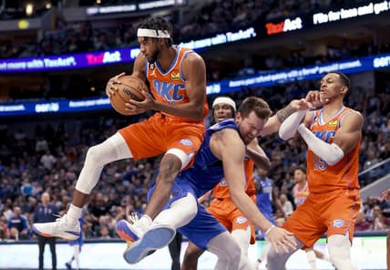 Oct 29, 2022; Dallas, Texas, USA;  Oklahoma City Thunder guard Isaiah Joe (11) grabs the ball away from Dallas Mavericks guard Luka Doncic (77) during the second half at American Airlines Center. Mandatory Credit: Kevin Jairaj-USA TODAY Sports