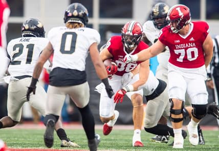 Indiana's AJ Barner (88) runs after the catch during the first half of the Indiana versus Purdue football game at Memorial Stadium on Saturday, Nov. 26, 2022.

Iu Pu 1h Barner 1