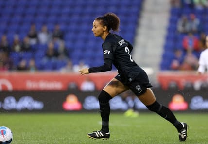 Oct 1, 2022; Harrison, New Jersey, USA; NJ/NY Gotham FC defender Estelle Johnson Mewis (24) kicks the ball against the Portland Thorns FC during the first half at Red Bull Arena. Mandatory Credit: Craig Mitchelldyer-USA TODAY Sports