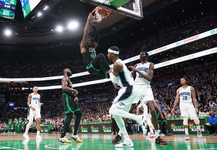 Dec 16, 2022; Boston, Massachusetts, USA; Boston Celtics center Robert Williams III (44) makes the basket against the Orlando Magic in the second half at TD Garden. Mandatory Credit: David Butler II-USA TODAY Sports