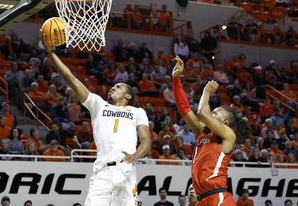 Feb 8, 2023; Stillwater, Oklahoma, USA; Oklahoma State Cowboys guard Bryce Thompson (1) goes to the basket in front of Texas Tech Red Raiders guard Lamar Washington (1) during the first half at Gallagher-Iba Arena. Mandatory Credit: Alonzo Adams-USA TODAY Sports