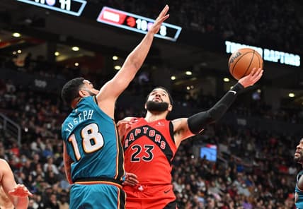 Feb 12, 2023; Toronto, Ontario, CAN; Toronto Raptors guard Fred VanVleet (23) is fouled as he shoots the ball by  Detroit Pistons guard Cory Joseph (18) in the first half at Scotiabank Arena. Mandatory Credit: Dan Hamilton-USA TODAY Sports