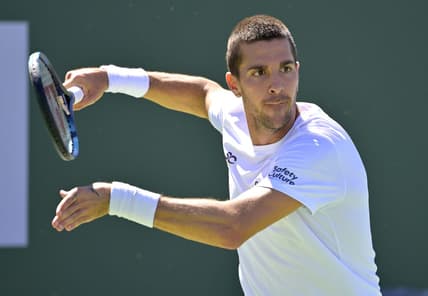 Mar 7, 2023; Indian Wells, CA, USA; Thanasi Kokkinakis (AUS) plays a point in his second qualifying match against Matteo Arnaldi (not pictured) during the BNP Paribas Open at the Indian Well Tennis Garden. Mandatory Credit: Jayne Kamin-Oncea-USA TODAY Sports