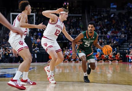 Mar 19, 2023; Albany, NY, USA; Miami (Fl) Hurricanes guard Harlond Beverly (5) drives to the basket against Indiana Hoosiers forward Miller Kopp (12) during the first half at MVP Arena. Mandatory Credit: Gregory Fisher-USA TODAY Sports