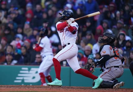 Apr 2, 2023; Boston, Massachusetts, USA; Boston Red Sox shortstop Enrique Hernandez (5) singles to right field to drive in a run against the Baltimore Orioles in the seventh inning at Fenway Park. Mandatory Credit: David Butler II-USA TODAY Sports
