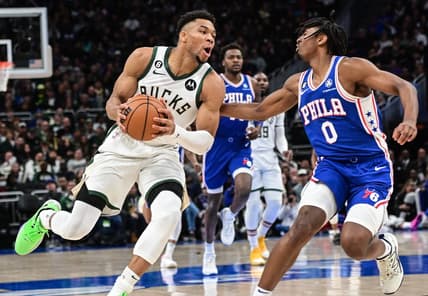 Apr 2, 2023; Milwaukee, Wisconsin, USA; Milwaukee Bucks forward Giannis Antetokounmpo (34) drives for the basket against Philadelphia 76ers guard Tyrese Maxey (0) in the first quarter at Fiserv Forum. Mandatory Credit: Benny Sieu-USA TODAY Sports