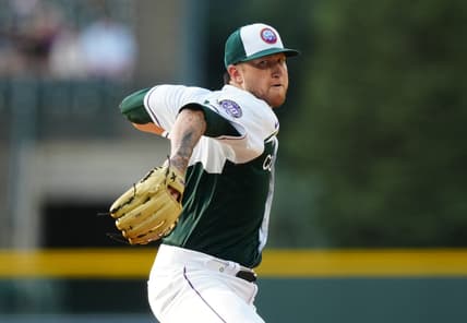 Jun 28, 2023; Denver, Colorado, USA; Colorado Rockies starting pitcher Kyle Freeland (21) delivers a pitch in the first inning against the Los Angeles Dodgers at Coors Field. Mandatory Credit: Ron Chenoy-USA TODAY Sports