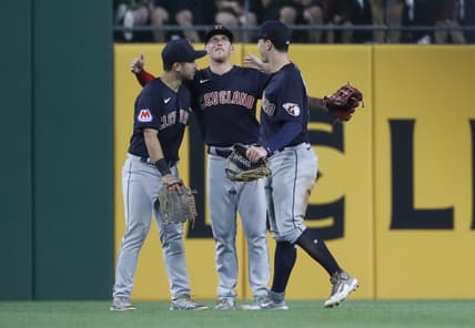 Jul 17, 2023; Pittsburgh, Pennsylvania, USA;  Cleveland Guardians left fielder Steven Kwan (left) and center fielder Myles Straw (middle) and right fielder David Fry (right) celebrate in the outfield after defeating the Pittsburgh Pirates at PNC Park. The Guardians shutout the Pirates 11-0. Mandatory Credit: Charles LeClaire-USA TODAY Sports