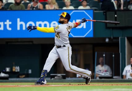 Aug 19, 2023; Arlington, Texas, USA;  Milwaukee Brewers first baseman Carlos Santana (41) hits a home run during the first inning against the Texas Rangers at Globe Life Field. Mandatory Credit: Kevin Jairaj-USA TODAY Sports