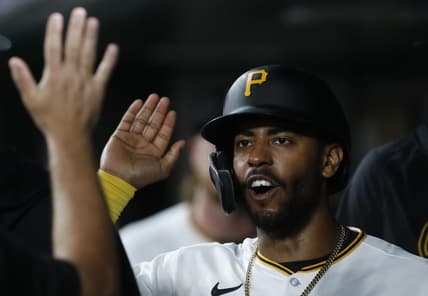 Aug 21, 2023; Pittsburgh, Pennsylvania, USA;  Pittsburgh Pirates right fielder Joshua Palacios (54) high-fives in the dugout after scoring a run against the St. Louis Cardinals during the eighth inning at PNC Park. Pittsburgh won 1-1. Mandatory Credit: Charles LeClaire-USA TODAY Sports