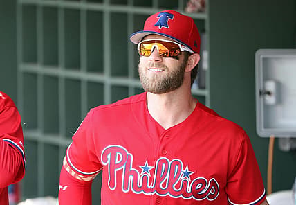 Mar 11, 2019; Clearwater, FL, USA; Philadelphia Phillies right fielder Bryce Harper (3) smiles in the dugout before  the game against the Tampa Bay Rays at Spectrum Field. Mandatory Credit: Kim Klement-USA TODAY Sports