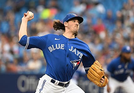 Jul 27, 2022; Toronto, Ontario, CAN; Toronto Blue Jays starting pitcher Kevin Gausman (34) delivers a pitch against the St. Louis Cardinals in the first inning at Rogers Centre. Mandatory Credit: Dan Hamilton-USA TODAY Sports