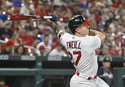 Aug 28, 2022; St. Louis, Missouri, USA;  St. Louis Cardinals left fielder Tyler O'Neill (27) hits a go ahead three run home run against the Atlanta Braves during the eighth inning at Busch Stadium. Mandatory Credit: Jeff Curry-USA TODAY Sports