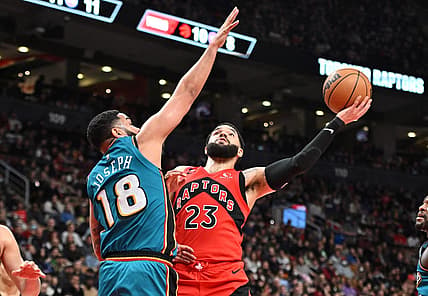 Feb 12, 2023; Toronto, Ontario, CAN; Toronto Raptors guard Fred VanVleet (23) is fouled as he shoots the ball by  Detroit Pistons guard Cory Joseph (18) in the first half at Scotiabank Arena. Mandatory Credit: Dan Hamilton-USA TODAY Sports