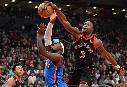 Mar 16, 2023; Toronto, Ontario, CAN; Toronto Raptors forward OG Anunoby (3) blocks a shot from Oklahoma City Thunder guard Luguentz Dort (5) in the first half at Scotiabank Arena. Mandatory Credit: Dan Hamilton-USA TODAY Sports