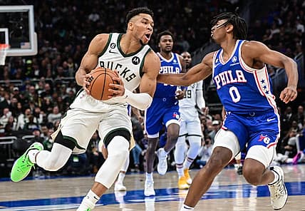 Apr 2, 2023; Milwaukee, Wisconsin, USA; Milwaukee Bucks forward Giannis Antetokounmpo (34) drives for the basket against Philadelphia 76ers guard Tyrese Maxey (0) in the first quarter at Fiserv Forum. Mandatory Credit: Benny Sieu-USA TODAY Sports