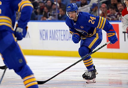 Oct 23, 2023; Buffalo, New York, USA;  Buffalo Sabres center Dylan Cozens (24) looks for the puck during the third period against the Montreal Canadiens at KeyBank Center. Mandatory Credit: Timothy T. Ludwig-USA TODAY Sports