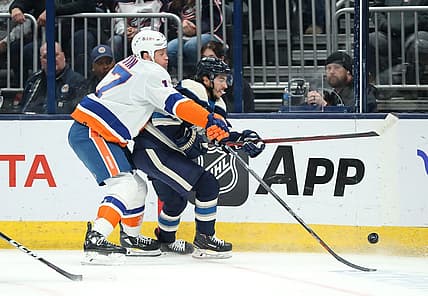 Oct 28, 2023; Columbus, Ohio, USA; New York Islanders left wing Matt Martin (17) fights for the puck with Columbus Blue Jackets left wing Johnny Gaudreau (13)during the first period at Nationwide Arena. Mandatory Credit: Joseph Maiorana-USA TODAY Sports