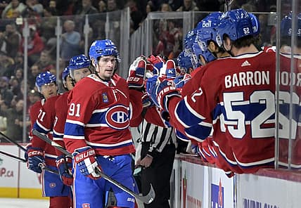 Dec 4, 2023; Montreal, Quebec, CAN; Montreal Canadiens forward Sean Monahan (91) celebrates with teammates after scoring a goal against the Seattle Kraken during the first period at the Bell Centre. Mandatory Credit: Eric Bolte-USA TODAY Sports