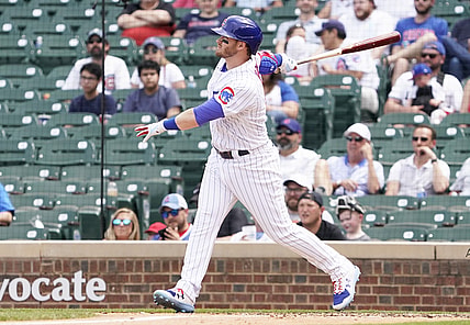 May 20, 2021; Chicago, Illinois, USA; Chicago Cubs center fielder Ian Happ (8) hits a two run home run against the Washington Nationals during the third inning at Wrigley Field. Mandatory Credit: David Banks-USA TODAY Sports