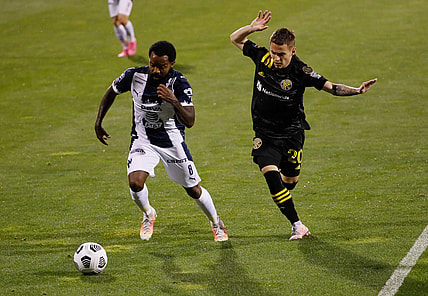 Columbus Crew SC midfielder Alexandru Matan (20) chases down CF Monterrey forward Dorlan Pab  n (8) during the second half of the first leg of the CONCACAF Champions League quarterfinals at Crew Stadium in Columbus on Wednesday, April 28, 2021.

Columbus Crew Sc Vs Cf Monterrey