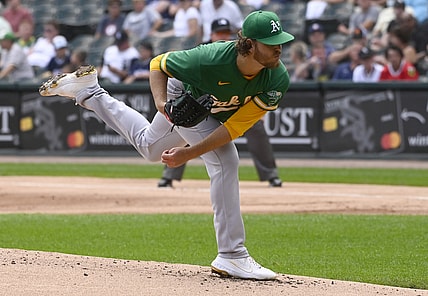 Aug 19, 2021; Chicago, Illinois, USA; Oakland Athletics starting pitcher Cole Irvin (19) delivers against the Chicago White Sox during the first inning at Guaranteed Rate Field. Mandatory Credit: Matt Marton-USA TODAY Sports