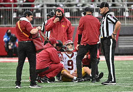 Sep 18, 2021; Pullman, Washington, USA; USC Trojans quarterback Kedon Slovis (9) is checked out by medical staff during a game against the Washington State Cougars in the first half at Gesa Field at Martin Stadium. Mandatory Credit: James Snook-USA TODAY Sports