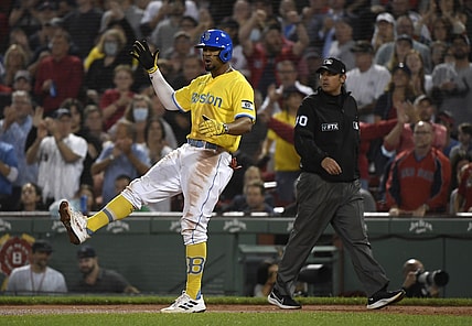 Sep 21, 2021; Boston, Massachusetts, USA;  Boston Red Sox shortstop Xander Bogaerts (2) reacts after hitting a RBI single against the New York Mets during the sixth inning at Fenway Park. Mandatory Credit: Bob DeChiara-USA TODAY Sports