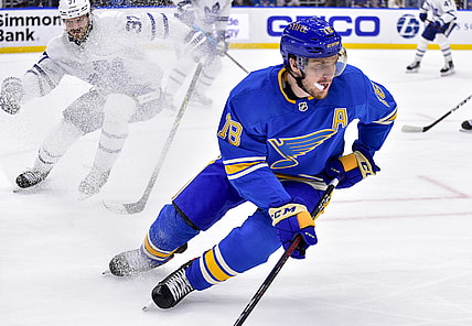 Jan 15, 2022; St. Louis, Missouri, USA;  St. Louis Blues center Robert Thomas (18) controls the puck against the Toronto Maple Leafs during the second period at Enterprise Center. Mandatory Credit: Jeff Curry-USA TODAY Sports