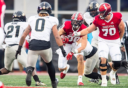 Indiana's AJ Barner (88) runs after the catch during the first half of the Indiana versus Purdue football game at Memorial Stadium on Saturday, Nov. 26, 2022.

Iu Pu 1h Barner 1