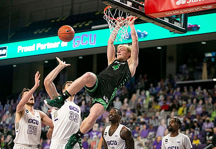 March 5, 2021; Phoenix, AZ, USA; Utah Valley's guard Trey Woodbury (4) dunks the ball at Grand Canyon University Arena on March 5, 2021. Credit: Meg Potter/The Arizona Republic

Grand Canyon University