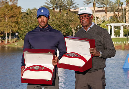 Dec 18, 2022; Orlando, Florida, USA; Vijay Singh (right) and Qass Singh hold up the Champions trophy after winning the PNC Championship golf tournament at Ritz Carlton Golf Club Grande Lakes Orlando Course. Mandatory Credit: Reinhold Matay-USA TODAY Sports