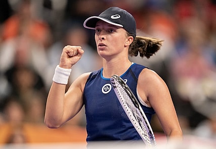Nov 5, 2022; Forth Worth, TX, USA; Iga Swiatek (POL) reacts after a point against Coco Gauff (USA) during a match on day six of the WTA Finals at Dickies Arena. Mandatory Credit: Susan Mullane-USA TODAY Sports
