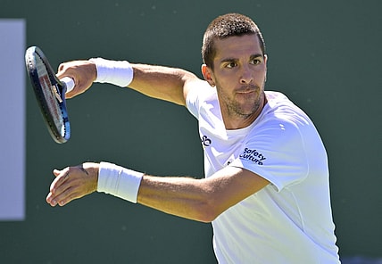 Mar 7, 2023; Indian Wells, CA, USA; Thanasi Kokkinakis (AUS) plays a point in his second qualifying match against Matteo Arnaldi (not pictured) during the BNP Paribas Open at the Indian Well Tennis Garden. Mandatory Credit: Jayne Kamin-Oncea-USA TODAY Sports