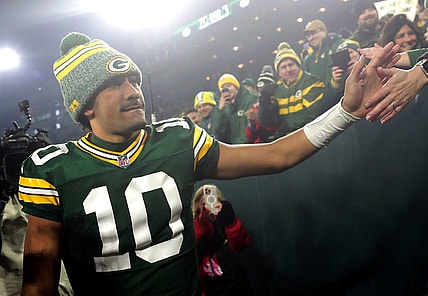 Green Bay Packers quarterback Jordan Love (10) shakes hands with fans following the Packers victory over the Chicago Bears during their football game Sunday, January 7, 2024, at Lambeau Field in Green Bay, Wis. The Packers defeated the Bears 17-9.