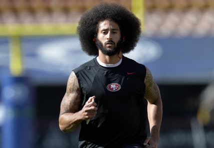 NFL QB Colin Kaepernick warms up