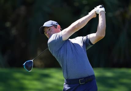 Mar 11, 2021; Ponte Vedra Beach, Florida, USA; Rory McIlroy hits his tee shot on the 7th hole during the first round of The Players Championship golf tournament at TPC Sawgrass - Stadium Course. Mandatory Credit: Jasen Vinlove-USA TODAY Sports