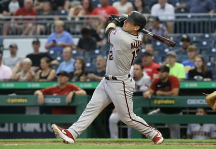 Aug 23, 2021; Pittsburgh, Pennsylvania, USA; Arizona Diamondbacks right fielder Daulton Varsho (12) hits a solo home run against the Pittsburgh Pirates during the second inning at PNC Park. Mandatory Credit: Charles LeClaire-USA TODAY Sports