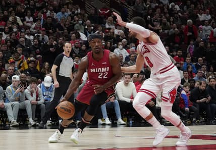 Apr 2, 2022; Chicago, Illinois, USA; Miami Heat forward Jimmy Butler (22) drives on Chicago Bulls guard Zach LaVine (8) during the second half at United Center. Mandatory Credit: David Banks-USA TODAY Sports