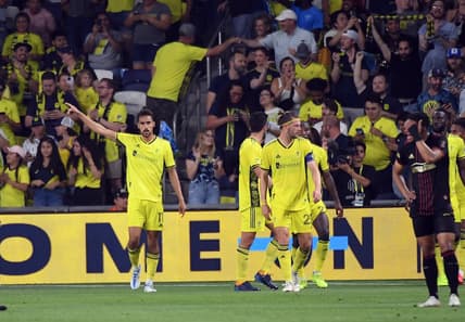May 11, 2022; Nashville, Tennessee, USA; Nashville SC forward Ethan Zubak (11) celebrates after scoring the game-winning goal in overtime against the Atlanta United at Geodis Park. Mandatory Credit: Christopher Hanewinckel-USA TODAY Sports