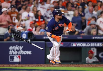 Nov 5, 2022; Houston, Texas, USA; Houston Astros designated hitter Christian Vazquez (9) hits a one run single against the Philadelphia Phillies during the sixth inning in game six of the 2022 World Series at Minute Maid Park. Mandatory Credit: Troy Taormina-USA TODAY Sports