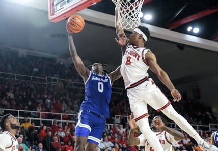 Feb 1, 2023; Queens, New York, USA;  Seton Hall Pirates guard Kadary Richmond (0) looks to drive past St. John's Red Storm guard AJ Storr (2) in the first half at Carnesecca Arena. Mandatory Credit: Wendell Cruz-USA TODAY Sports