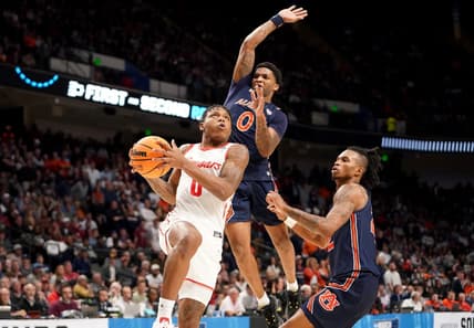 Mar 18, 2023; Birmingham, AL, USA; Houston Cougars guard Marcus Sasser (0) drives past Auburn Tigers guard K.D. Johnson (0) during the second half at Legacy Arena. Mandatory Credit: Marvin Gentry-USA TODAY Sports
