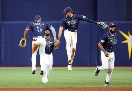 Apr 12, 2023; St. Petersburg, Florida, USA; Tampa Bay Rays shortstop Wander Franco (5), right fielder Josh Lowe (15), right fielder Manuel Margot (13) and left fielder Randy Arozarena (56) celebrate after they defeated the Boston Red Sox at Tropicana Field. Mandatory Credit: Kim Klement-USA TODAY Sports