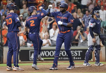 Jul 31, 2023; Houston, Texas, USA; Houston Astros left fielder Yordan Alvarez (44) celebrates his three-run home run with right fielder Kyle Tucker (30) and third baseman Alex Bregman (2) against the Cleveland Guardians in the sixth inning at Minute Maid Park. Mandatory Credit: Thomas Shea-USA TODAY Sports