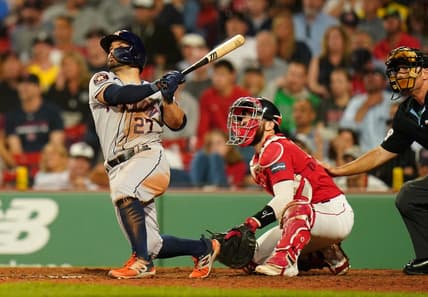 Aug 28, 2023; Boston, Massachusetts, USA; Houston Astros second baseman Jose Altuve (27) hits a two run home run against the Boston Red Sox in the eighth inning at Fenway Park. Mandatory Credit: David Butler II-USA TODAY Sports